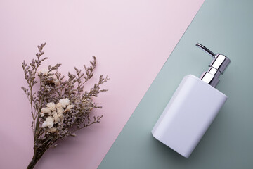 natural cosmetics bottle containers on color paper background, empty bottle ,natural beauty skincare product,  beauty product concept 
