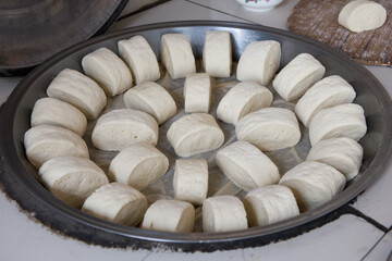 chinese family made steamed roll in a container