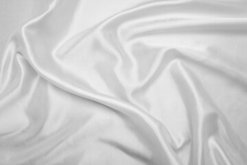 White cloth background abstract with soft waves, closeup texture of cloth
