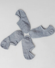Plain gray socks for men and women. Socks are usually used to protect the feet from direct friction...