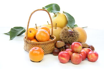 Naklejka na ściany i meble 秋の味覚　柿、りんご、梨、栗の盛り合わせ