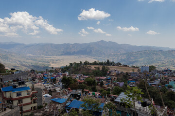 Fototapeta na wymiar The scenic beauty landscape view of Tundikhel, Tansen and Madi Phat, Tansen from the Shreenagar Hill of Tansen, Palpa, Nepal