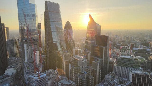 Skyscrapers In City Financial Centre Against at sunrise.
