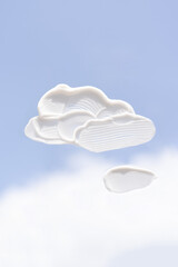 The texture of the cream on the blue sky.