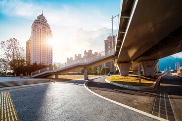 Fototapeta premium asphalt road leading into the city at night , jiangxi province, China