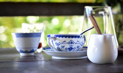 hot coffee and tea cups on the table in the coffee cafe