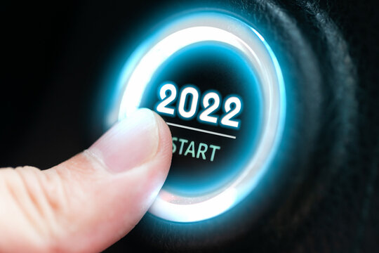 Finger press ignition button with the text 2022 start. business start-up concept. - Powered by Adobe