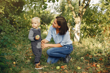 Fototapeta premium Cute and stylish family in a spring park