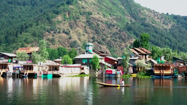 Srinagar, India 07 - July, 2018 : Lifestyle in Dal lake, local man use shikara boat, This is the local transportation in the lake of Srinagar. Jammu and Kashmir state, India