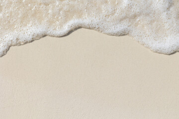 Tropical beach background with sea waves, white sand - summer holiday background. Travel and beach...