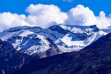 Fototapeta na wymiar Snow caped Mountains near Dhankar Monastery, at Dhankar, Lahaul Spiti Region, Himachal Pradesh India