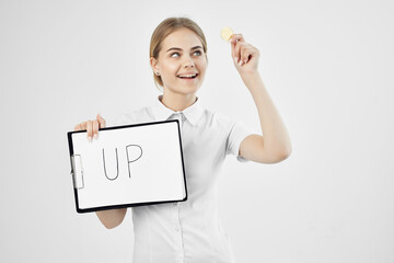 cheerful woman in a white shirt with a folder in hand isolated background