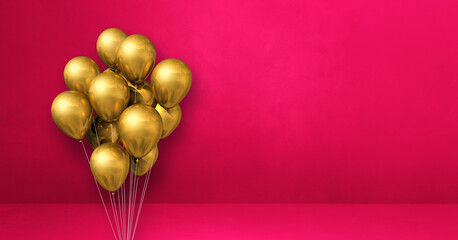 Gold balloons bunch on a pink wall background. Horizontal banner.