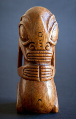traditional wooden Polynesian tiki from Marquesas Islands