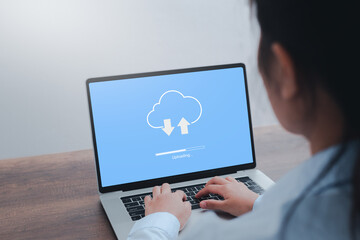 Cloud technology, Woman doing cloud uploading on laptop in office. computer at office, Data...