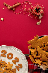 gingerbread cookie flatley cinnamon and burgundy background new year