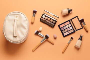 Stylish bag and decorative cosmetics on color background