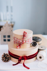 Round gifts for Christmas stylishly wrapped in craft paper