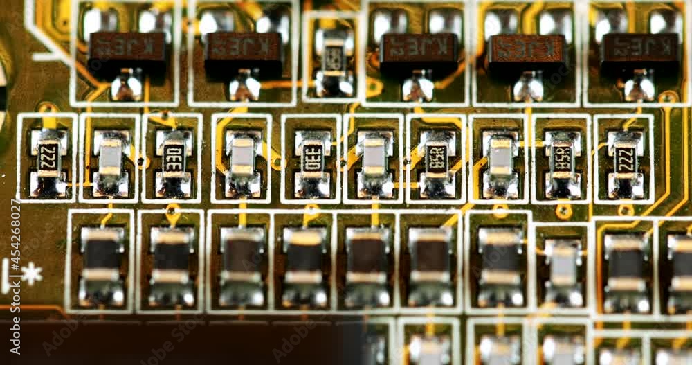 Poster electrical components mounted on surface of printed circuit board. macro shot