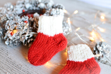 Cute and small festive newborn baby socks made of soft woolen yarn