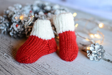 Cute and small festive newborn baby socks made of soft woolen yarn