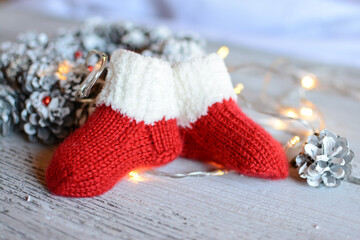 Cute and small festive newborn baby socks made of soft woolen yarn