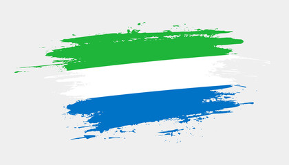 Hand drawn brush stroke flag of Sierra Leone. Creative national day hand painted brush illustration on white background