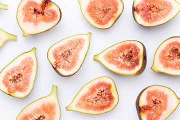 Fig fruits isolated on white background. Top view. Flat lay pattern