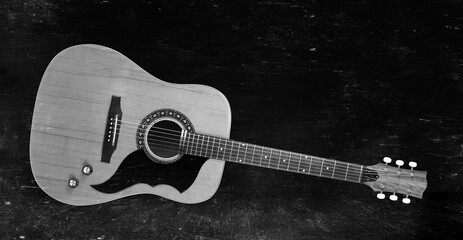 Naklejka na ściany i meble Musical instrument - Front view vintage acoustic guitar monochrome vintage background