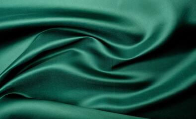 green fabric texture background, abstract, closeup texture of cloth
