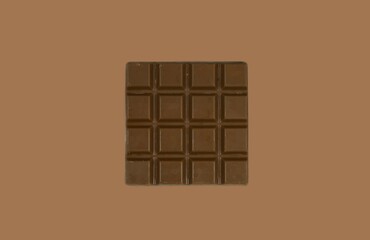 Brown chocolate bar on a brown background