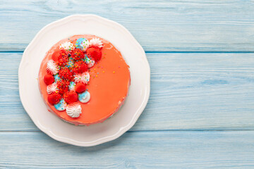 Birthday cake on wooden table