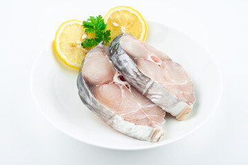 Fresh mackerel pieces on white back