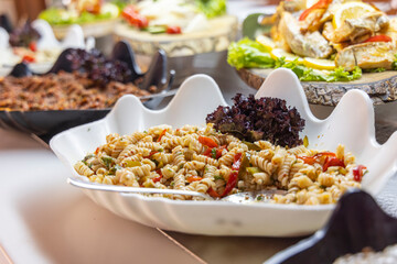 pasta with vegetables at a hotel buffet