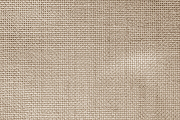 Brown sackcloth texture or background and empty space. Jute burlap canvas texture. Background for text and picture.