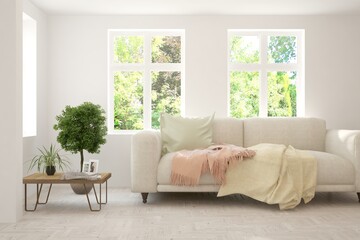 White living room with sofa and summer landscape in window. Scandinavian interior design. 3D illustration
