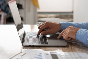 business executives are discussing to change their business concept to increase profits and the strength of their business with using laptop for work.