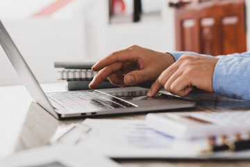 business executives are discussing to change their business concept to increase profits and the strength of their business with using laptop for work.