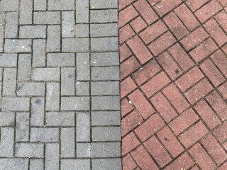 Obraz premium Grey and Brown floor bricks laid side by side.