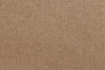 Dark brown linen fabric cloth texture for background, natural textile pattern.
