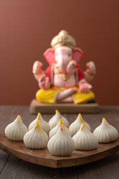 Steamed Modak, ukdiche modak, white modak made from rice flour and coconut jaggery filling. Modak is a traditional Indian sweet made during Ganesh Utsav and also offered to Lord Ganesha.