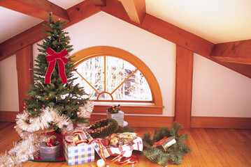 family decorating christmas tree