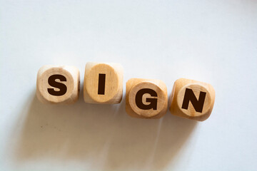 Sign Word Written In Wooden Cubes On an isolated light table. Singing, karaoke or vocal training concept.
