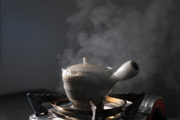 Soft focus, Cauldron with Chinese tea. Japanese Tea - Hot Teapot.