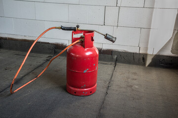 Propane butane bomb and torch for conctruction insulation and roofing