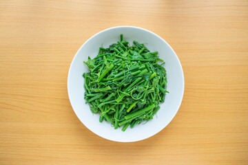 Obraz na płótnie Canvas A dish of fried asparagus