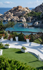 Fototapeta premium garden and turquoise sea of Cala Spinosa - bay in the La Maddalena Archipelago - sardinia travel destination