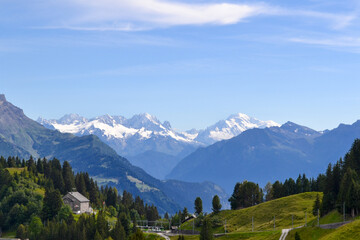 Fototapeta na wymiar Swiss mountains in the summer. Swiss Alps panoramic view
