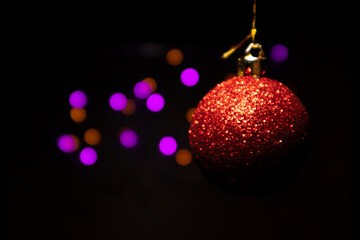 Bright Christmas decoration on a blurred background with garlands.