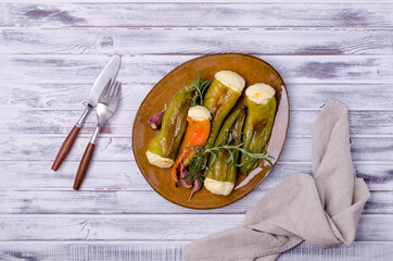 Baked green pepper stuffed with ricotta